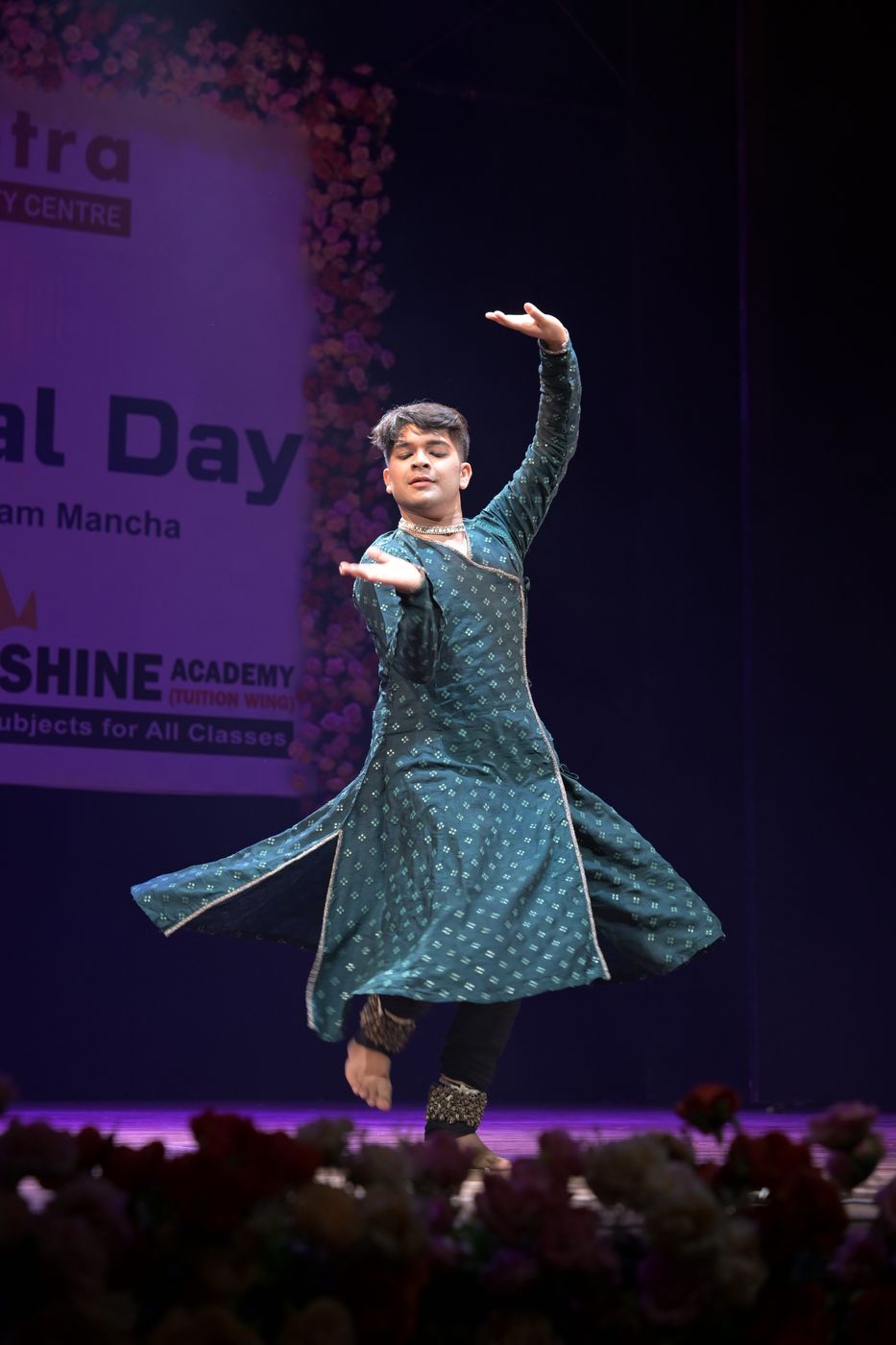 Kathak dancer captured mid-spin, skirt flaring outward