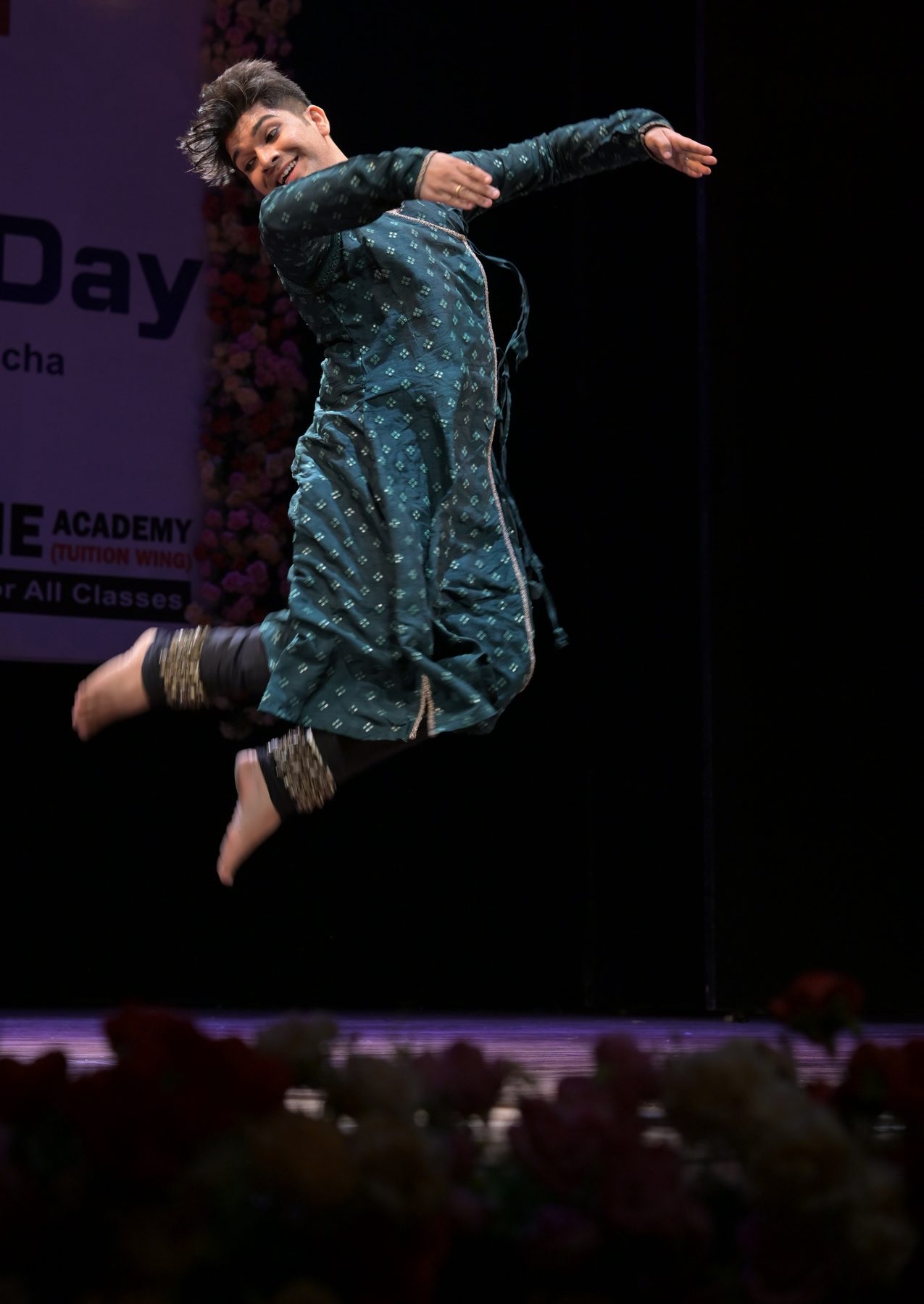 Kathak dancer in performance, mid-movement