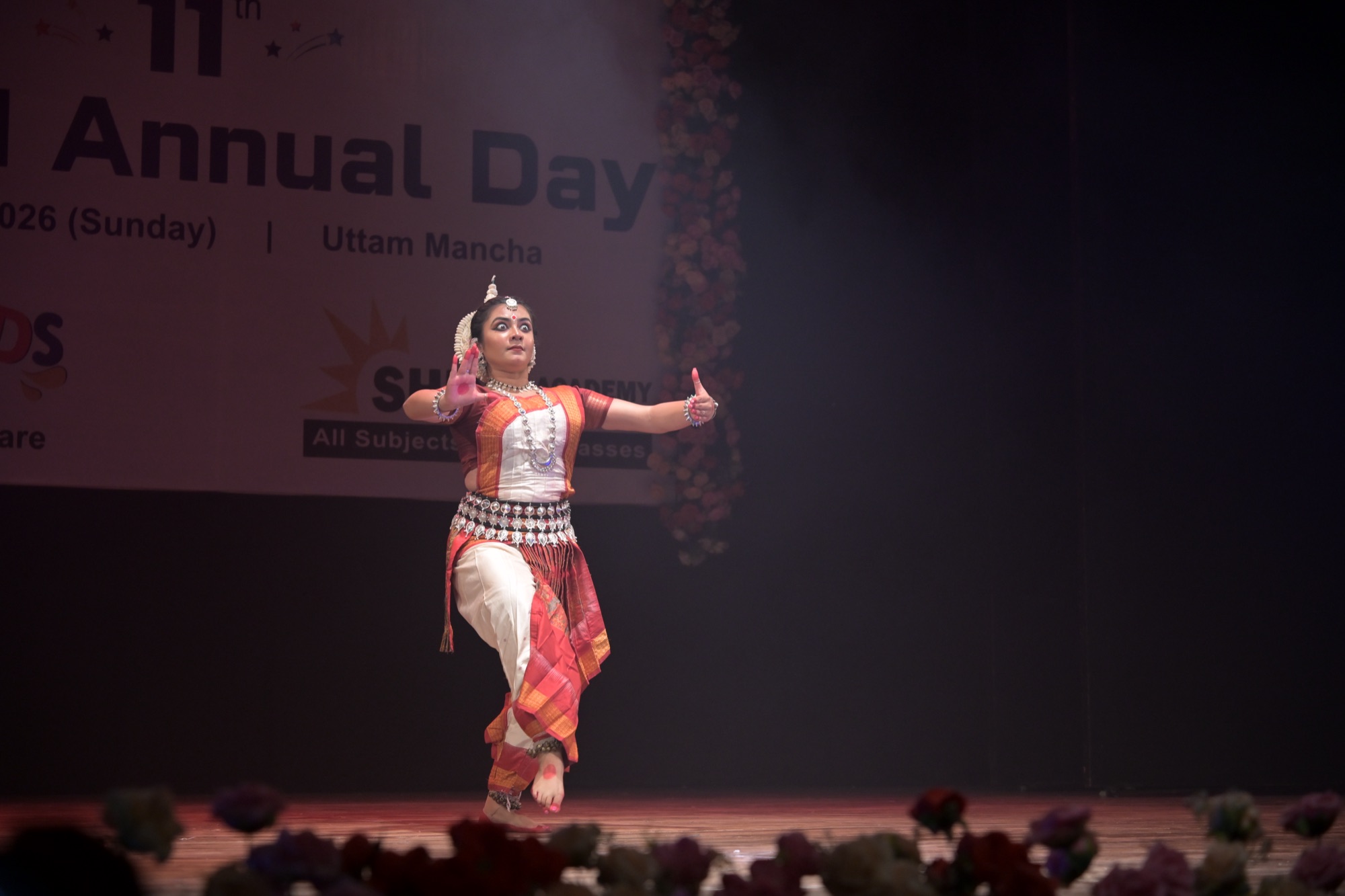 Odissi dancer with an intense expression and stylized hand gesture